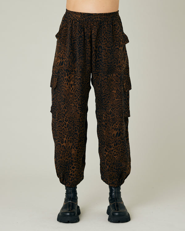 pregnant model wears dark leopard cupro sylvie trousers