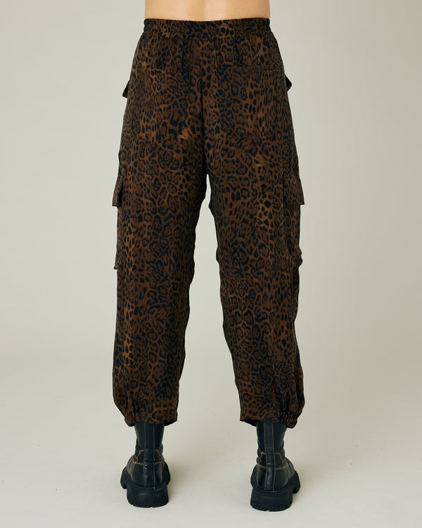 pregnant model wears dark leopard cupro sylvie trousers