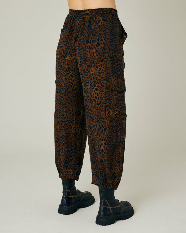 pregnant model wears dark leopard cupro sylvie trousers