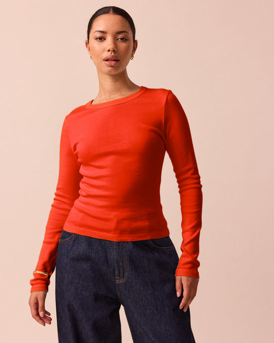 model wears lila red jersey top