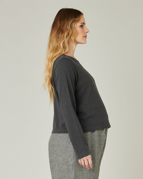 pregnant model wears slate boat neck top