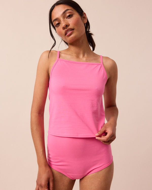 model wears candy vest top