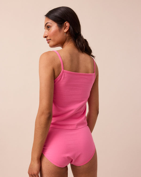 model wears candy vest top