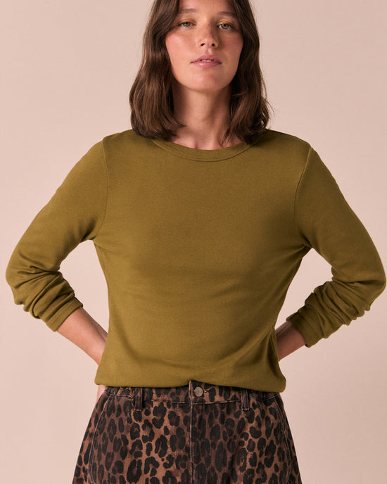 model wears lila olive jersey top