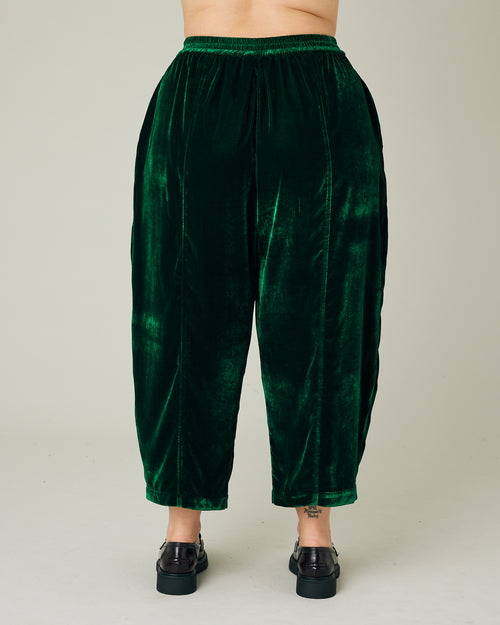 model wears green velvet mabel trousers