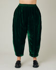 model wears green velvet mabel trousers