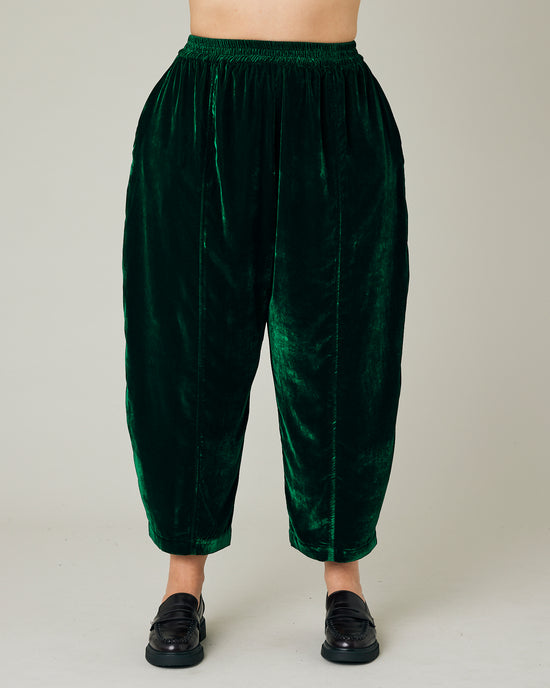 model wears green velvet mabel trousers