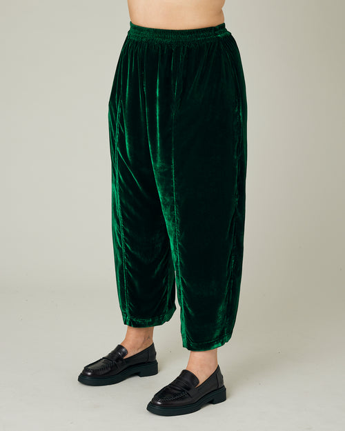 model wears green velvet mabel trousers