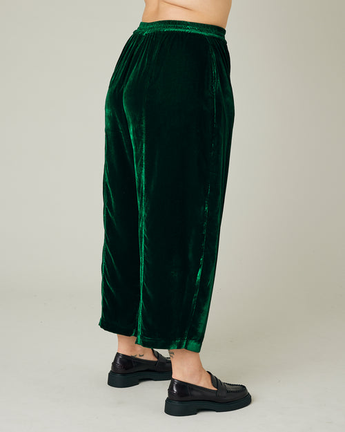 model wears green velvet mabel trousers