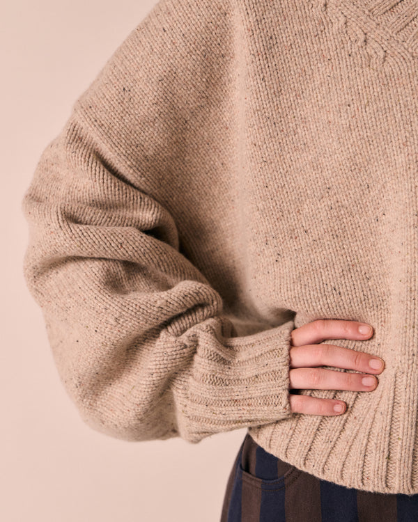 model wears phoebe pebble knitted jumper