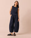 model wears daisy ink jersey trousers right