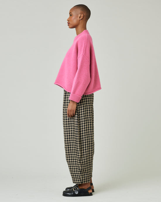 model wears coffee gingham daisy trousers 