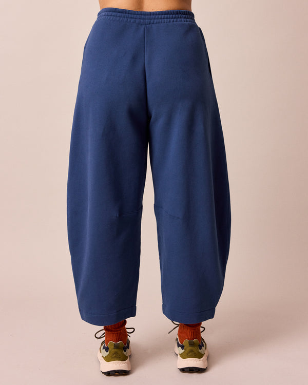 model wears french navy daisy fleeceback jersey trousers back