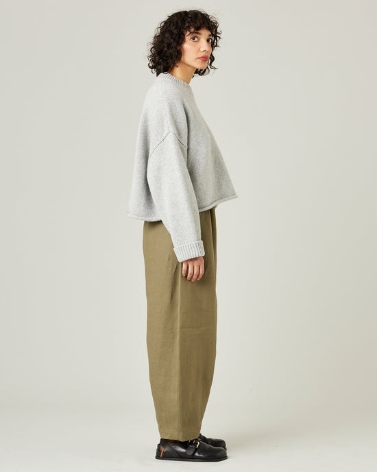 model wears light khaki linen daisy trousers 