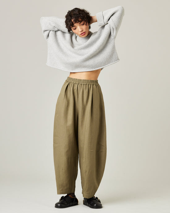 model wears light khaki linen daisy trousers 