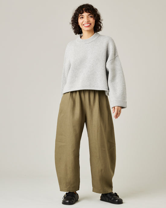 model wears light khaki linen daisy trousers 