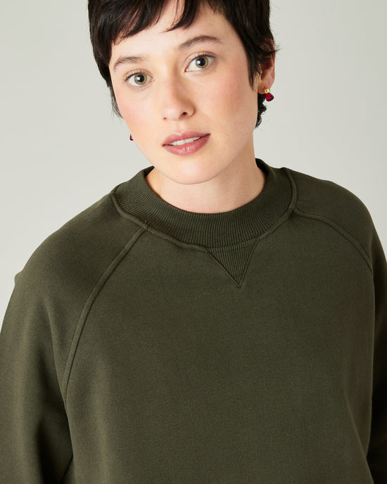 model wears olive noa jersey