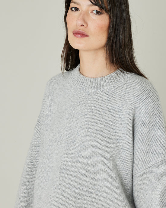 model wears silver knitted coco jumper