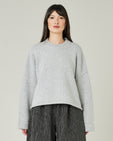 model wears silver knitted coco jumper