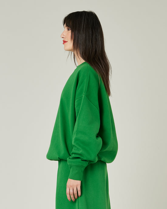 model wears juniper green jersey riley jumper