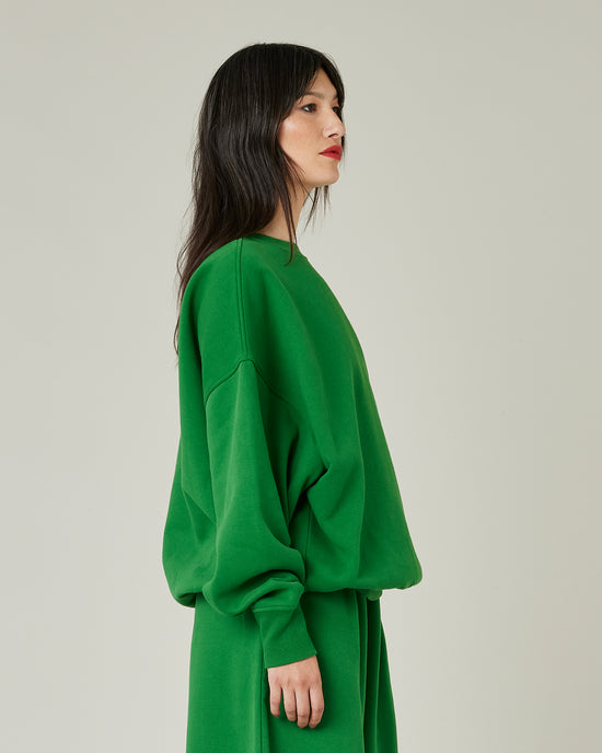 model wears juniper green jersey riley jumper