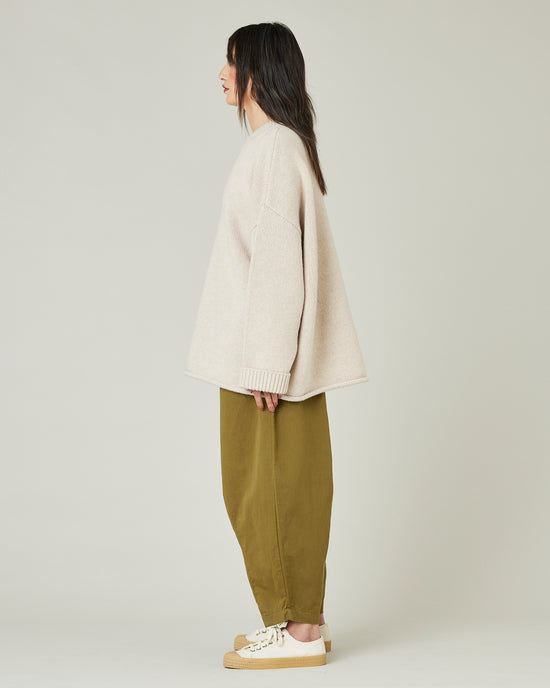 model wears Sicilian green daisy twill trousers 