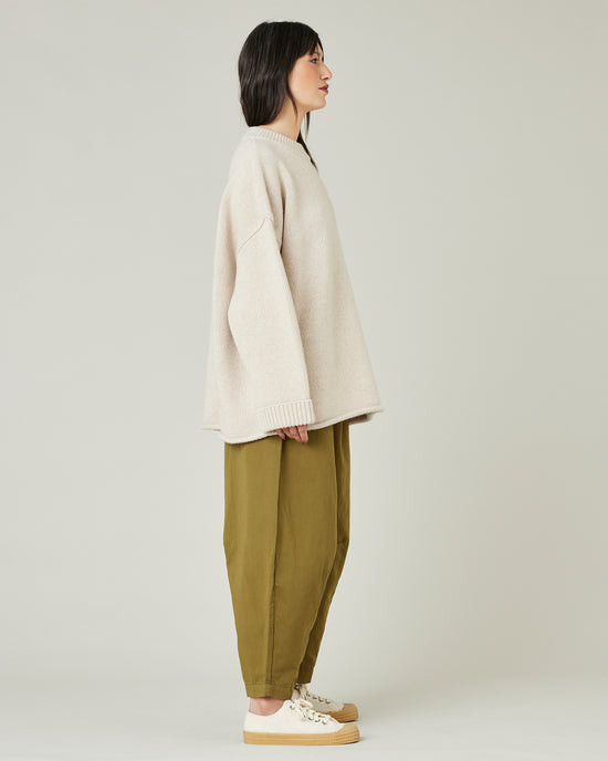 model wears Sicilian green daisy twill trousers 