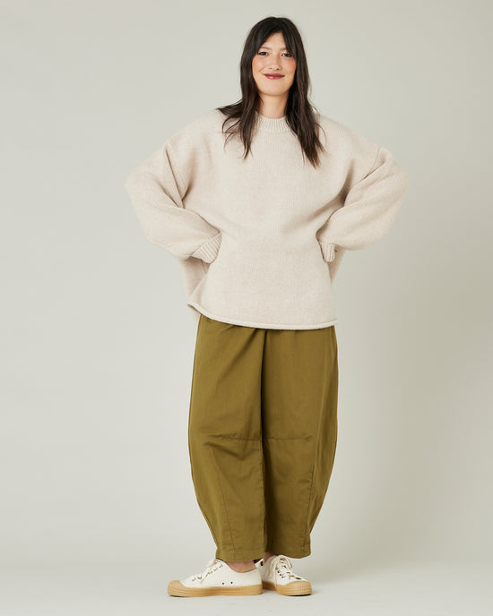 model wears Sicilian green daisy twill trousers 