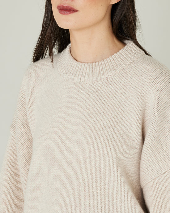 model wears oat knitted luna jumper