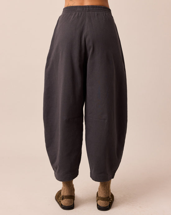 model wears daisy slate fleeceback jersey trousers back