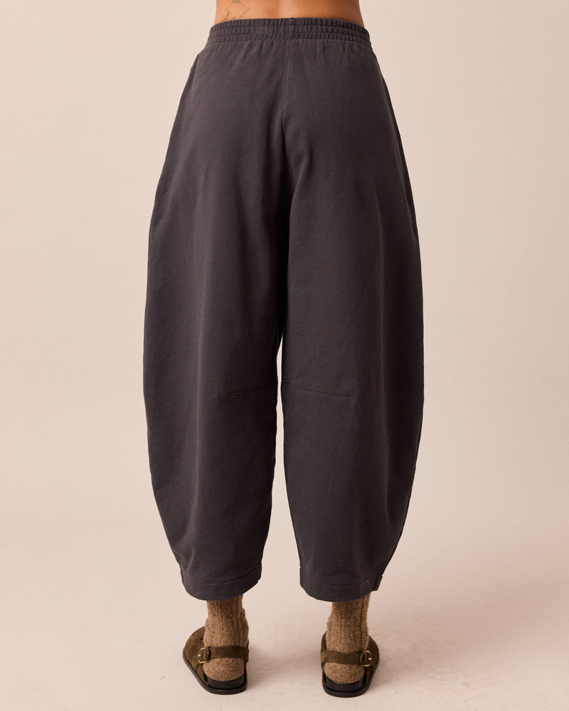 model wears daisy slate fleeceback jersey trousers back