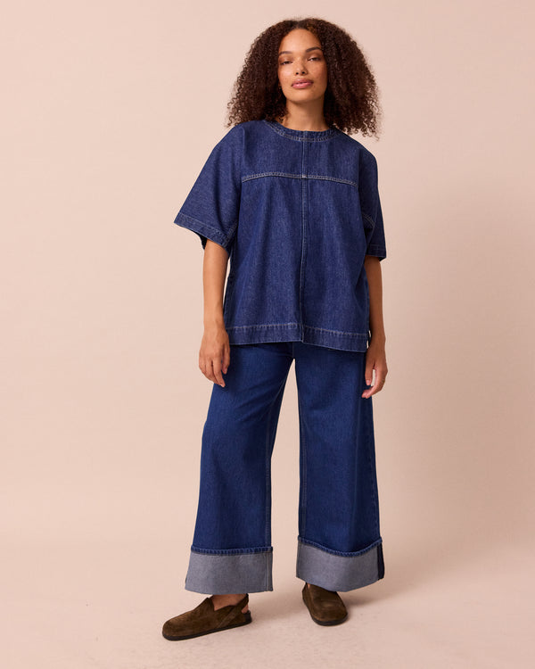 model wears deedee mid blue wash denim t shirt