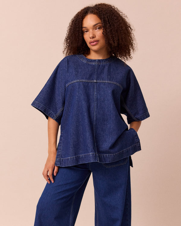 model wears deedee mid blue wash denim t shirt