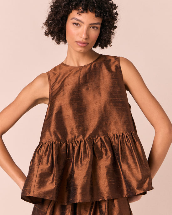 model wears demi pecan silk dupion top