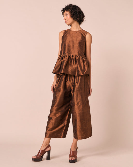model wears demi pecan silk dupion top