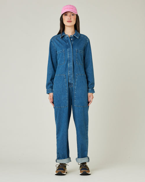 model wears mid blue denim coverall