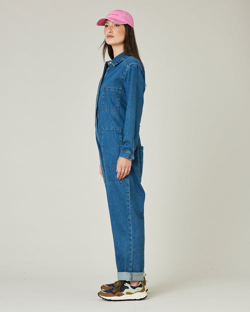 model wears mid blue denim coverall