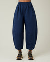 model wears navy daisy twill trousers front