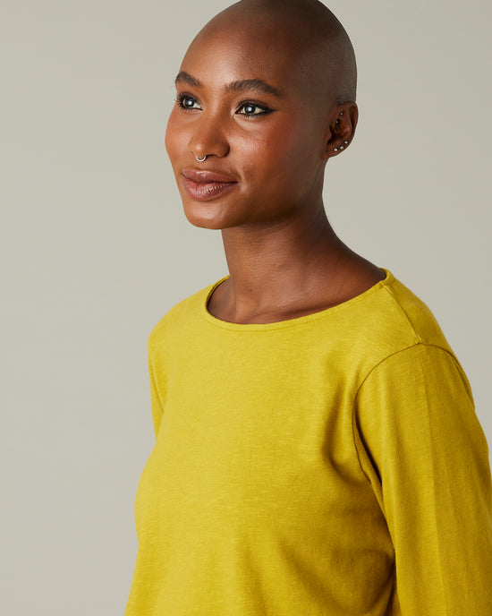 model wears dijon boat neck top