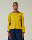 model wears dijon boat neck top