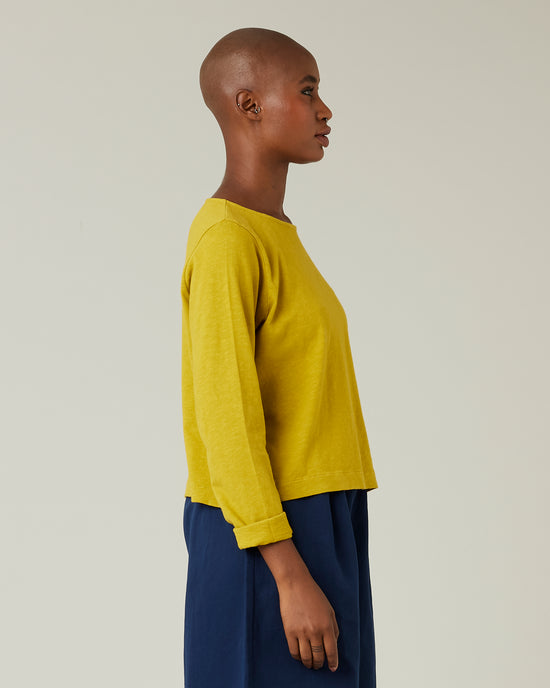 model wears dijon boat neck top