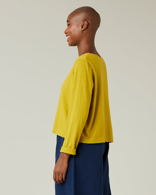 model wears dijon boat neck top