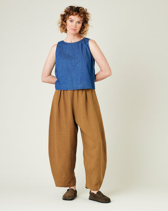 model wears bronze daisy linen trousers