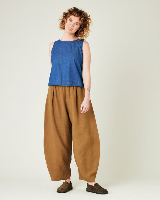 model wears bronze daisy linen trousers