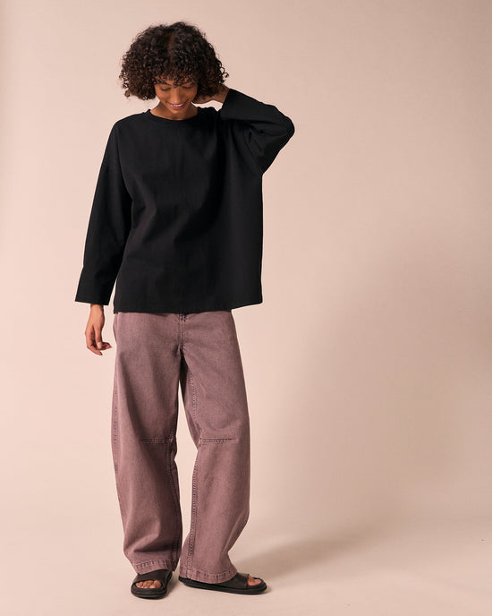 model wears robyn black jersey top