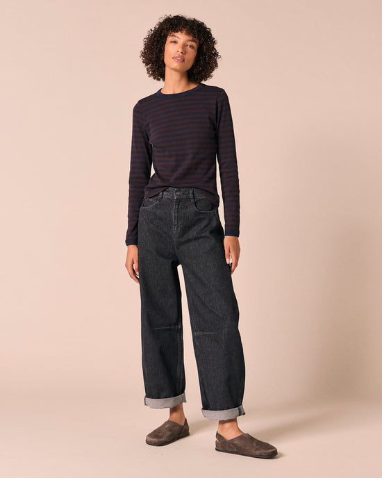model wears echo steel blue denim jeans right