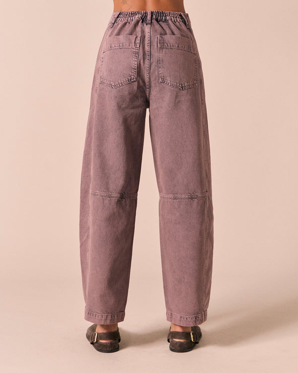 model wears echo smoked lilac denim jeans back