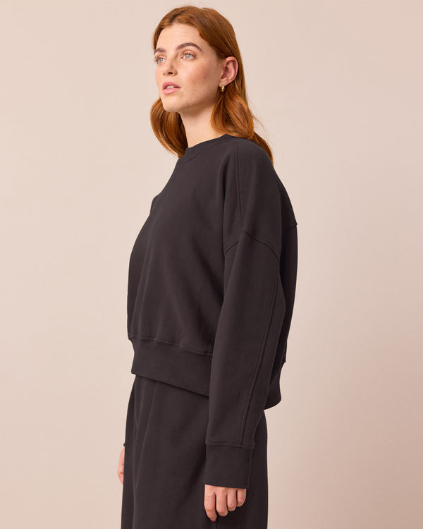 model wears eden slate jersey top