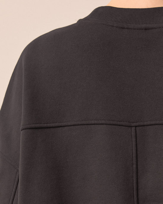 model wears eden slate jersey top