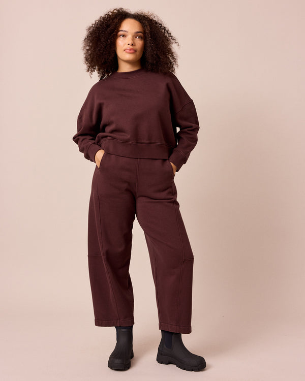 model wears eden black cherry eden jumper